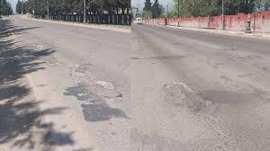 Bakıda yollarda yaranan &ccedil;uxurlar s&uuml;r&uuml;cələri ziyana salır  VİDEO