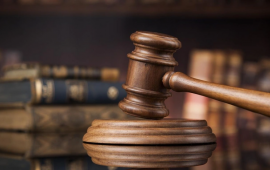 D&ouml;vlətə xəyanətdə təqsirləndirilən şəxsin məhkəməsi başladı